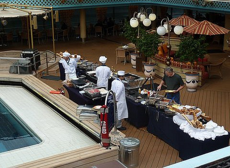 Serving a meal by the Lido Pool