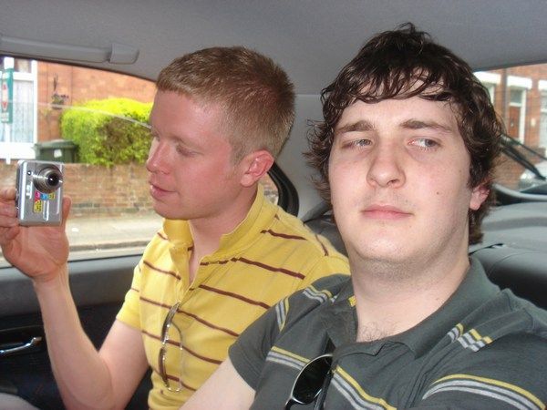 sean and dave in the car to the airport