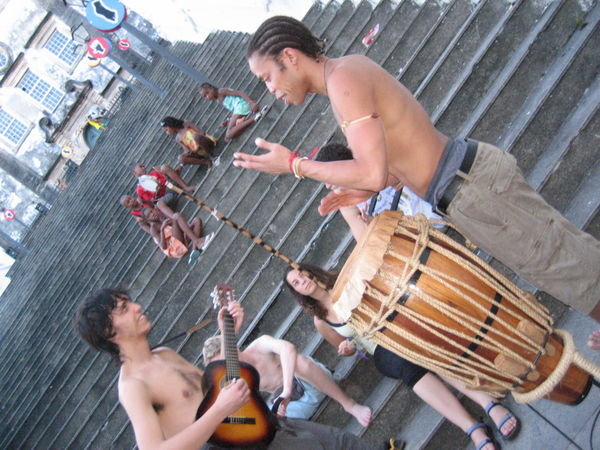 Playing music on the steps.