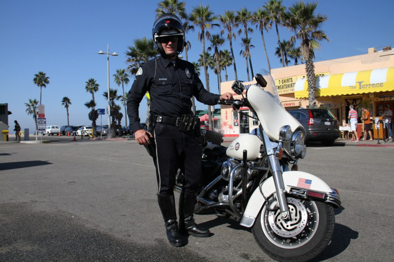 Policeman on a Harley...somebody got a fine