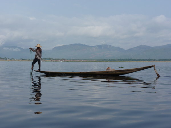 Fisherman rowing the Inle Lake way of rowing