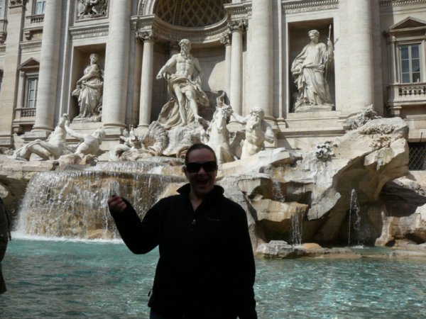 Trish throwing our last Czech crown into the Trevi Fountain