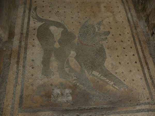 A Roman, Beware of the Dog (Cave Canem) mosaic at the entryway to a house in Pompeii