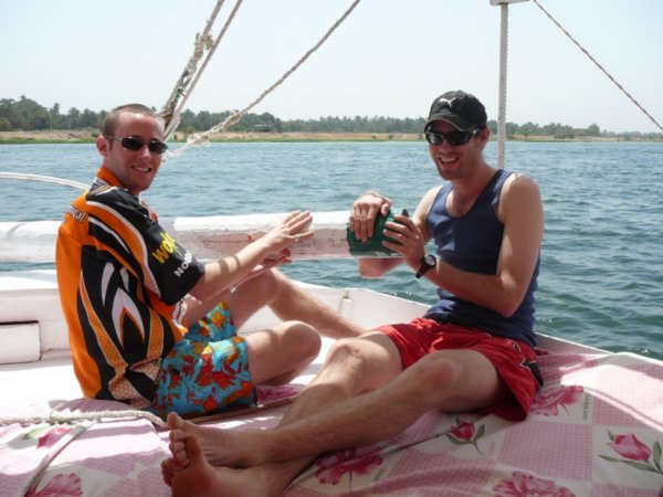 Captain Adam and Captain Dan sailing down the Nile
