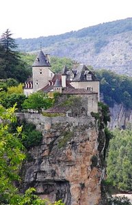 A Chateau Precariuosly Perched on a Cliff