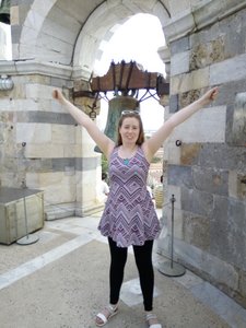 Triumphant at the top of the Leaning Tower of Pisa
