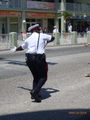 Cop Directing Traffic - Better in Video