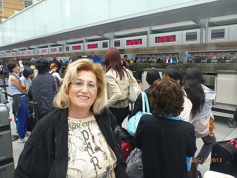 Mom at the Air France baggage counter