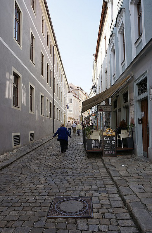 Mom walking a street in Bratislava 