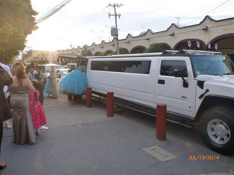 Sofia leaving in the Hummer limo. 