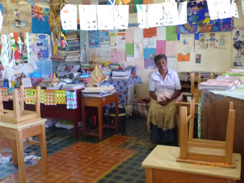 One of the Teachers in a Classroom. 