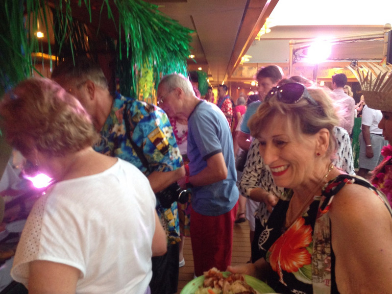 Mom in the Fruit Line at the Luau. 