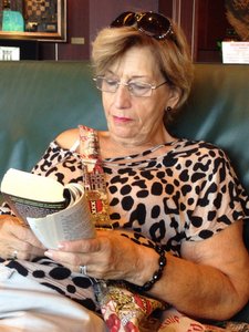 Mom Reading her &quot;Alien&quot; Book. She Likes Aliens. 