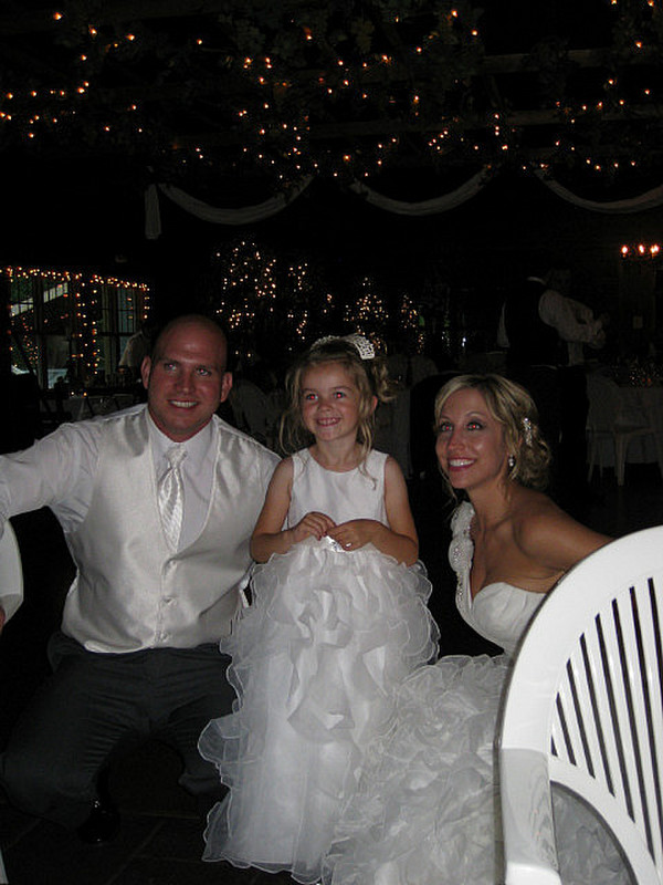 Bride and groom with Taylor the flower girl