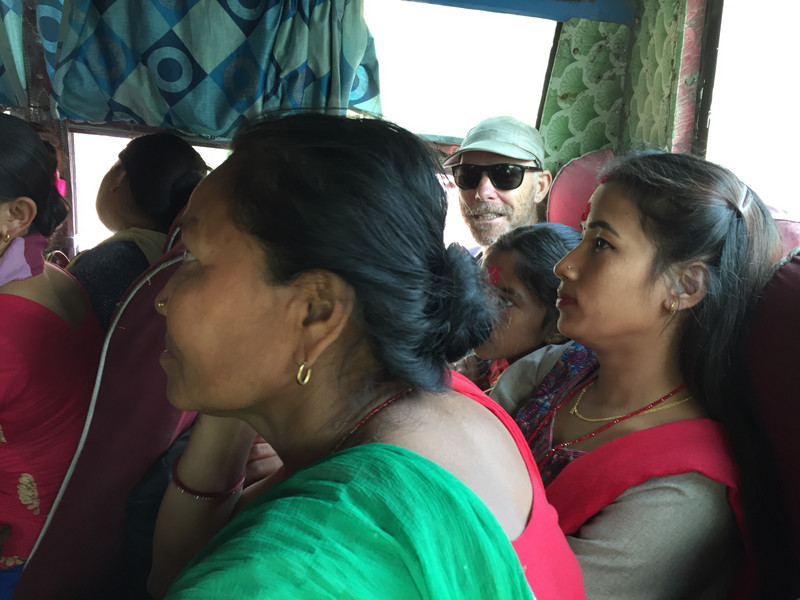Crowded  back row of the bus to Besisahar 