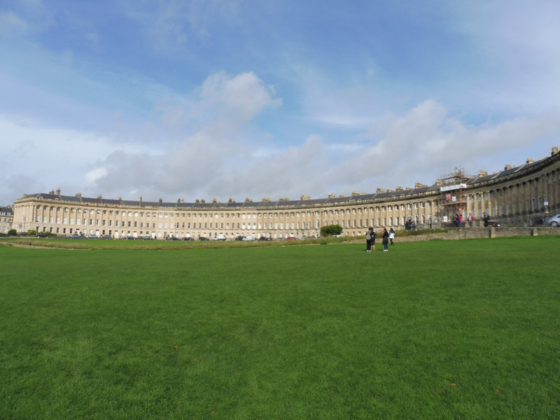 The Royal Crescent with its green lawn in front.