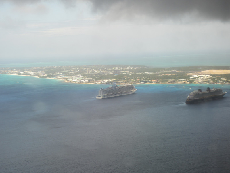 5 Caymans under the clouds