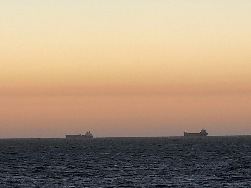 Ships going to Fremantle at sunset