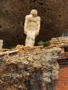 Imposing Cro Magnon statue at National Museum