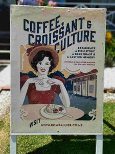 157 - The advertising for the coffee shop