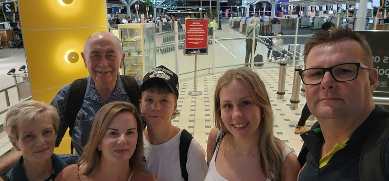 02 - The happy travellers at Departures in Brisbane