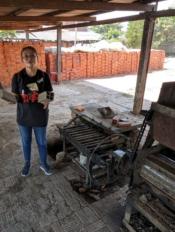 36 - Our guide Dani at the brick making machine
