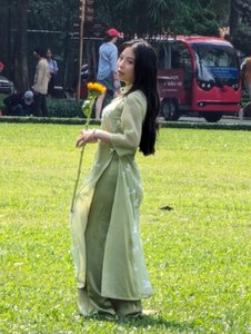 96 - Young lady in traditional Ao Dai