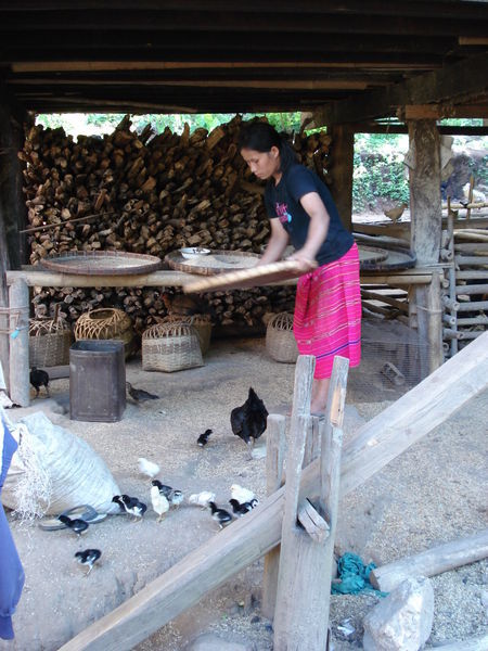 local in karen village preparing dinner