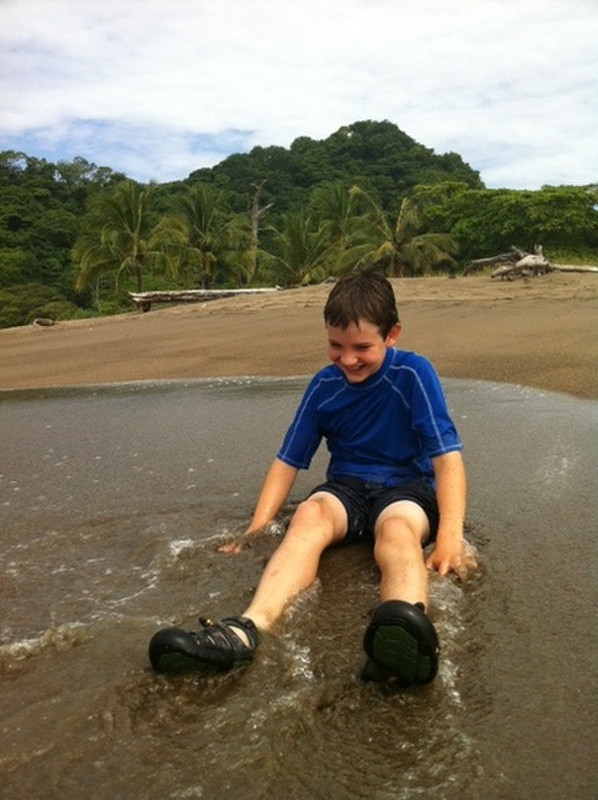 Alex enjoying the sand