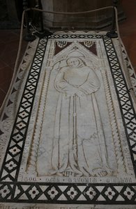 This particular one was roped off, but many of the crypt tops are worn completely down from centuries of people walking on them.  Much of the floor at Santa Croce is like this, so you sort of have to walk on them.