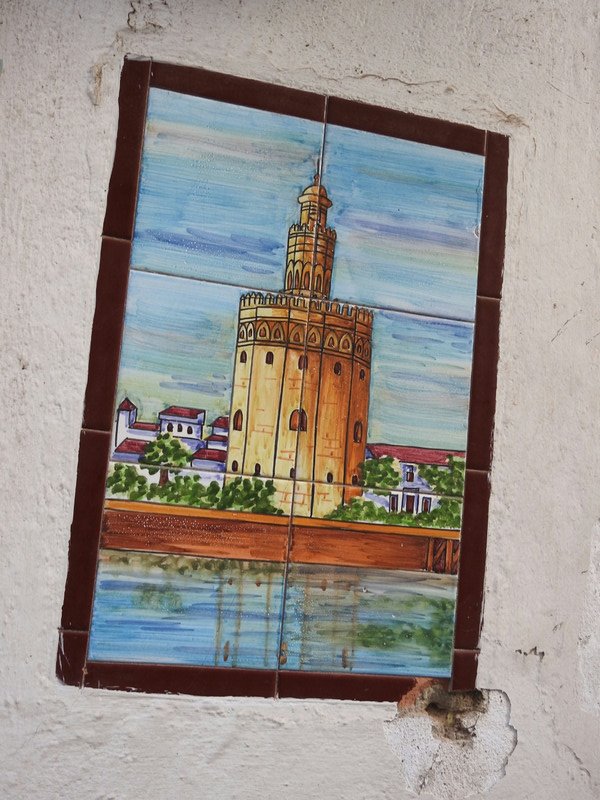 The same famous tower landmark on the riverbank...in tiles