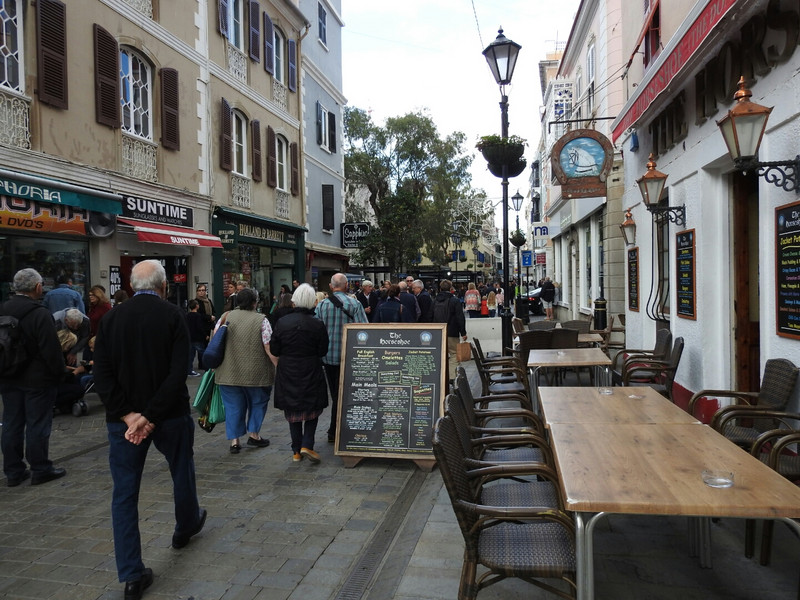 Long pedestrian Main Street of shops and pubs