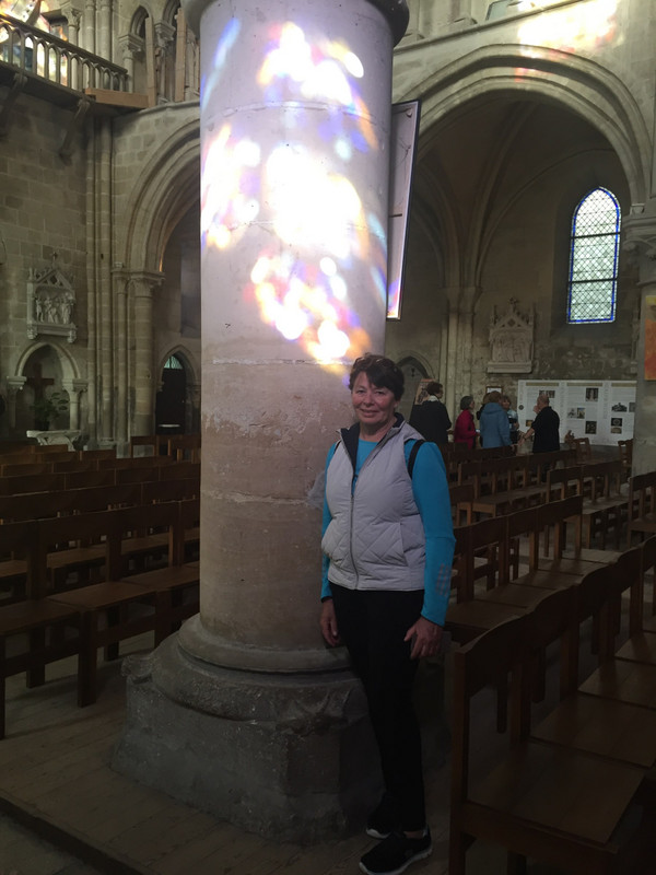 Jenny and the light coming through the stained glass windows