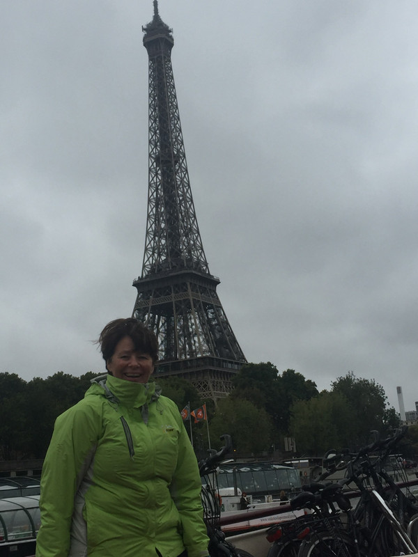 Jenny and the Eiffel Tower on a cloudy day