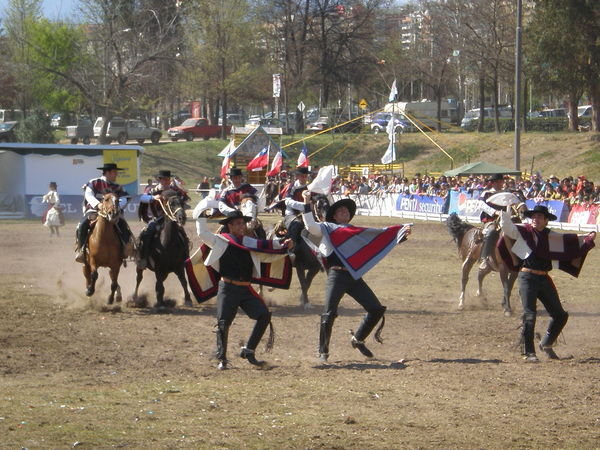 Huasos (chilean cowboys) dancing the cueca