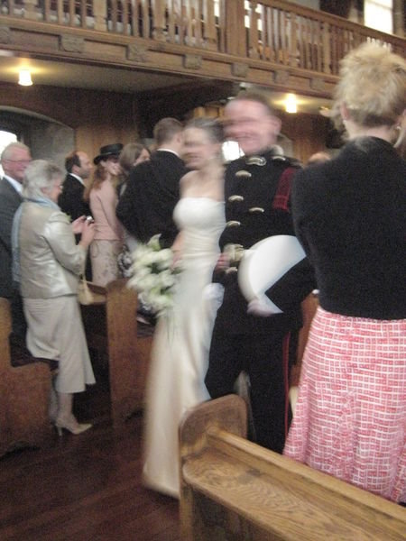 The new Mr. and Mrs. making a run for it...