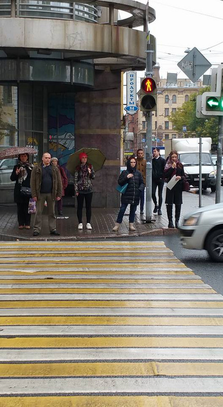people respect crosswalks; cars stop for pedestrians