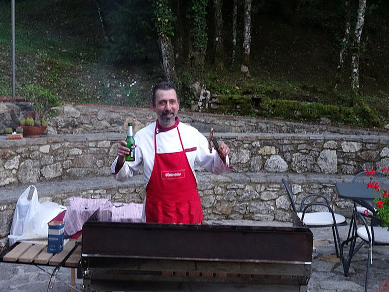 Our chef cooking the bbq, with a beer! 