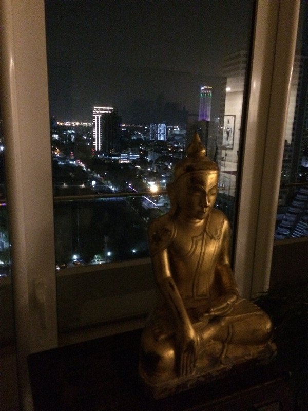 Buddha at 8 Gurney with coast line view in BG.