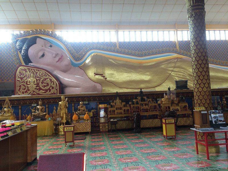 Giant reclining Buddha at Thai Buddhist temple - Penang
