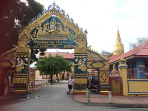 Gate at Thai Buddhist temple w-Darold - Penang