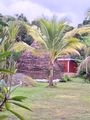 Easo, Lifou, New Caledonia - Typical Hut (and garage!).