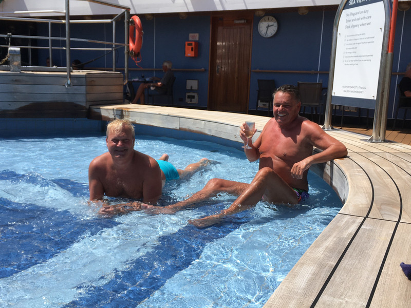 Noordam - Ron and Darold at back deck pool