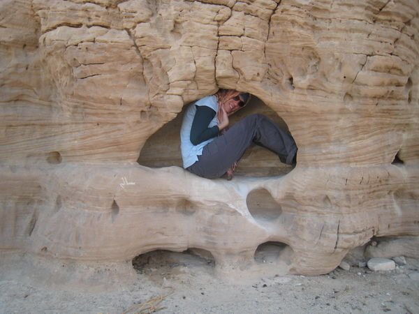 Ana gets some shade in the sandstone crevasse