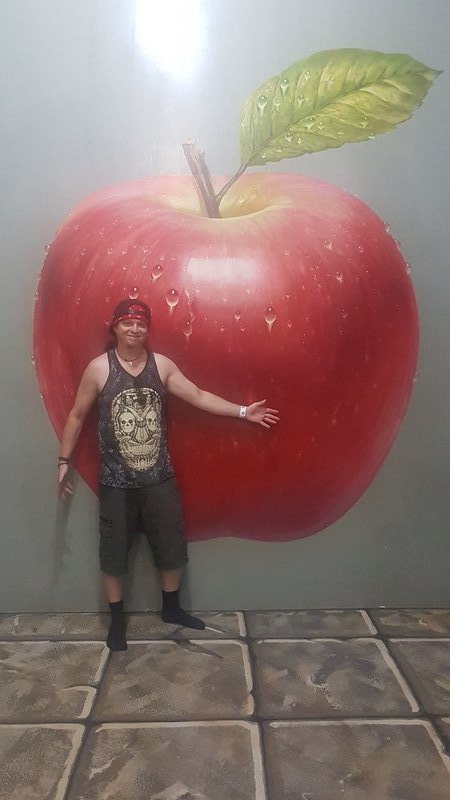 Had to get a pic of Kym infront of an apple