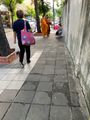 Monks receiving food offering