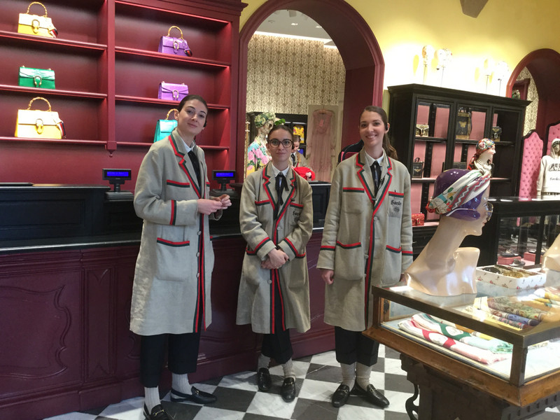 Very friendly Gucci assistants in Gucci duster jackets