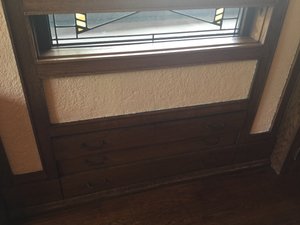Drawers under this window go in under the plant box outside