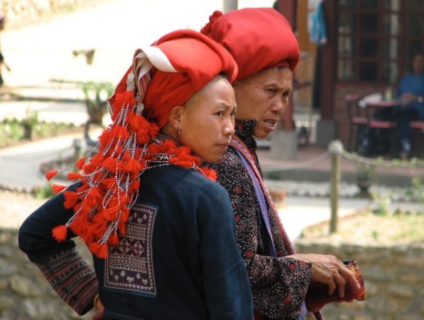 Red headdresses mark the Dzao people from the black H