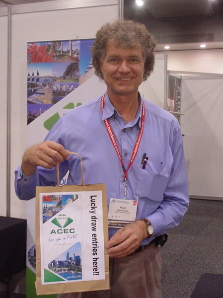 Paul advertising the bag where delegates were asked to put there details for ACEC 2012 info.